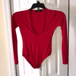 Red low cut body suit